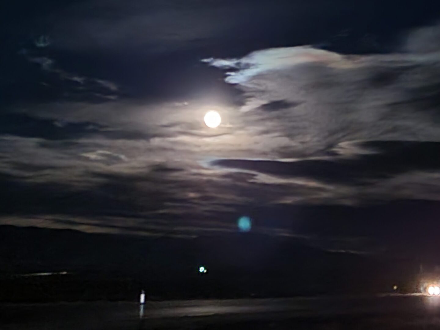 night natural scene with full moon covered with clouds