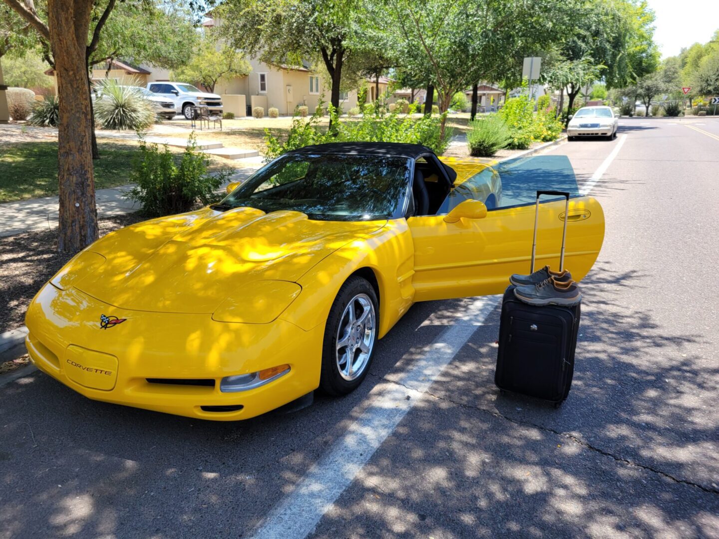 A modern sports cars stationary on an open road